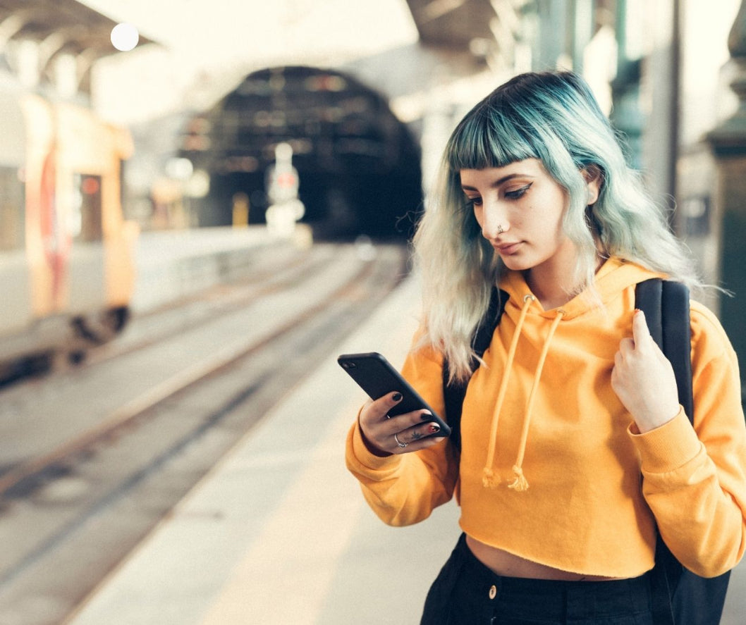 Neurodivergent woman holding a phone