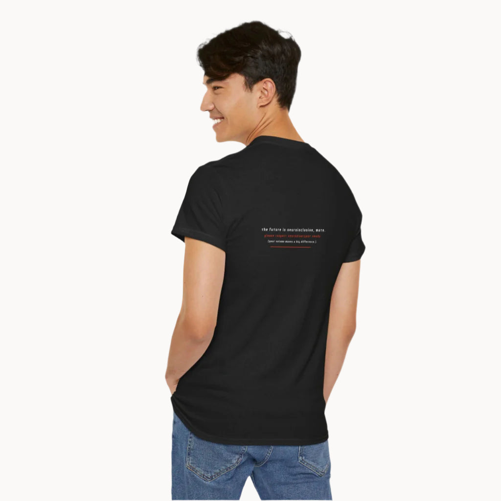 Young man with his back to the camera in a plain black t-shirt with the words 'The future is neuroinclusive mate your volume makes a difference' written on the back of the tee